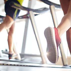 Images of legs running on a treadmill 