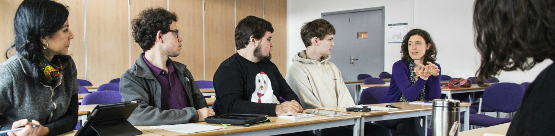 Five students in a seminar.