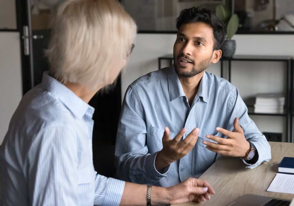 Two people talking