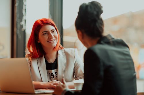 Two women talking