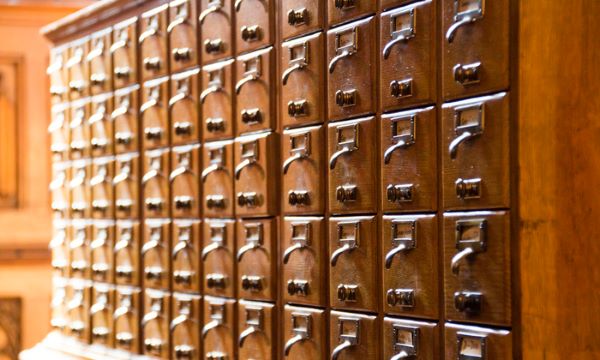 Wall of old fashioned wooden store boxes